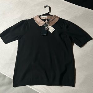 Black short sleeved sweater polo